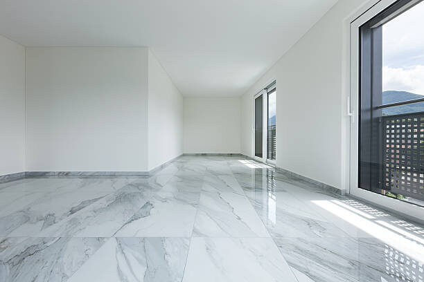 Interior of empty apartment, wide room with marble floor